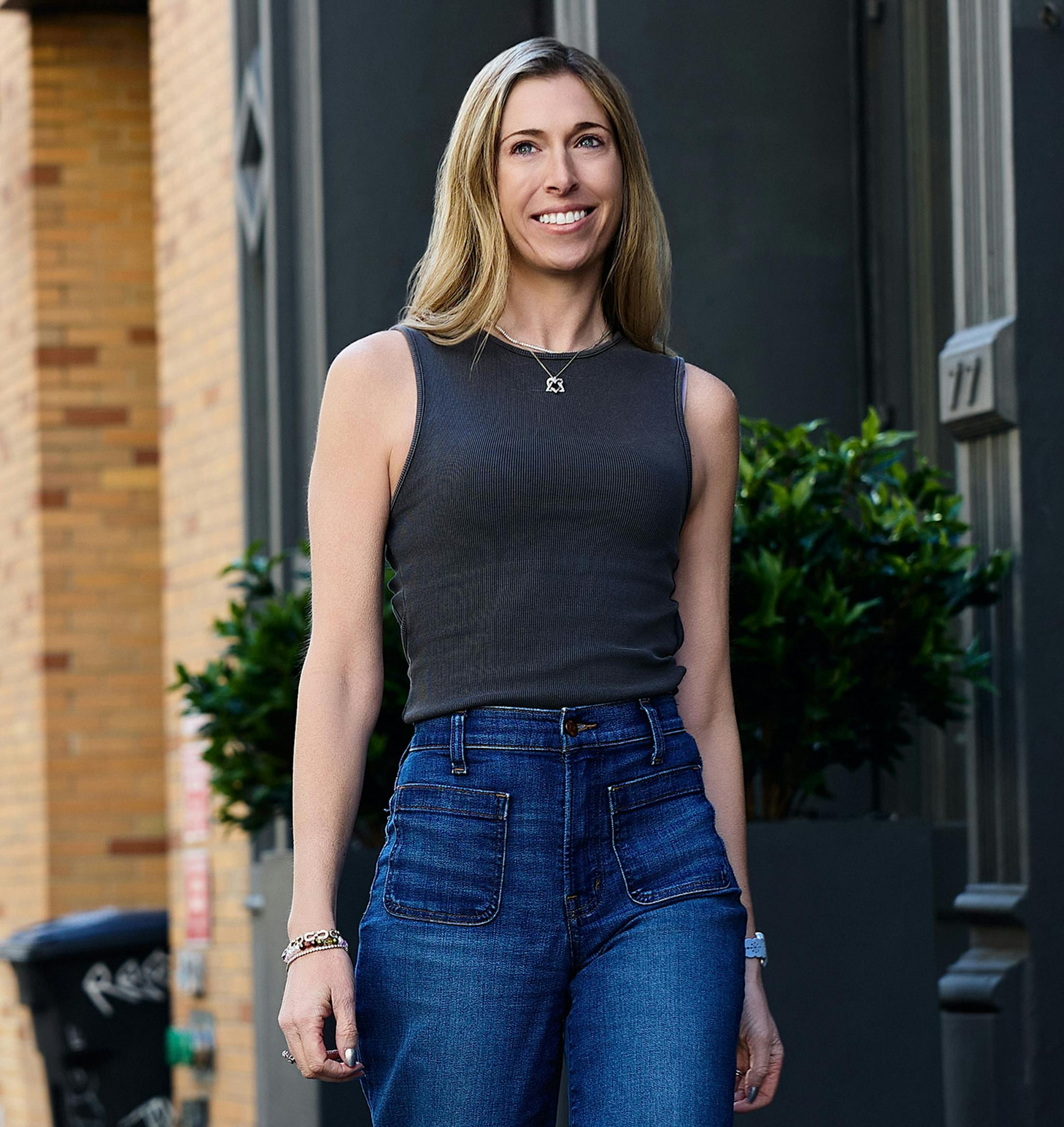 female patient smiling outside