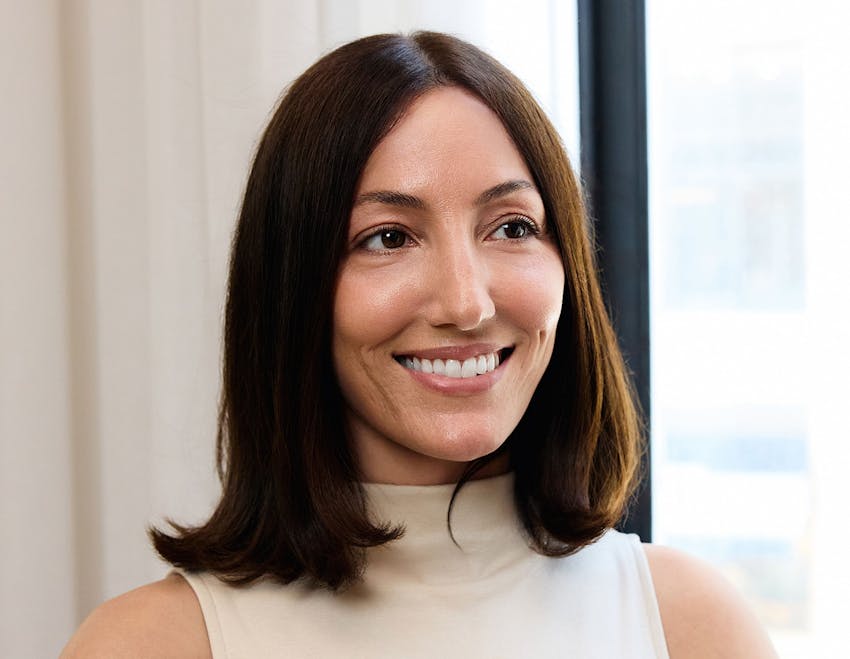 female patient with short hair and smiling