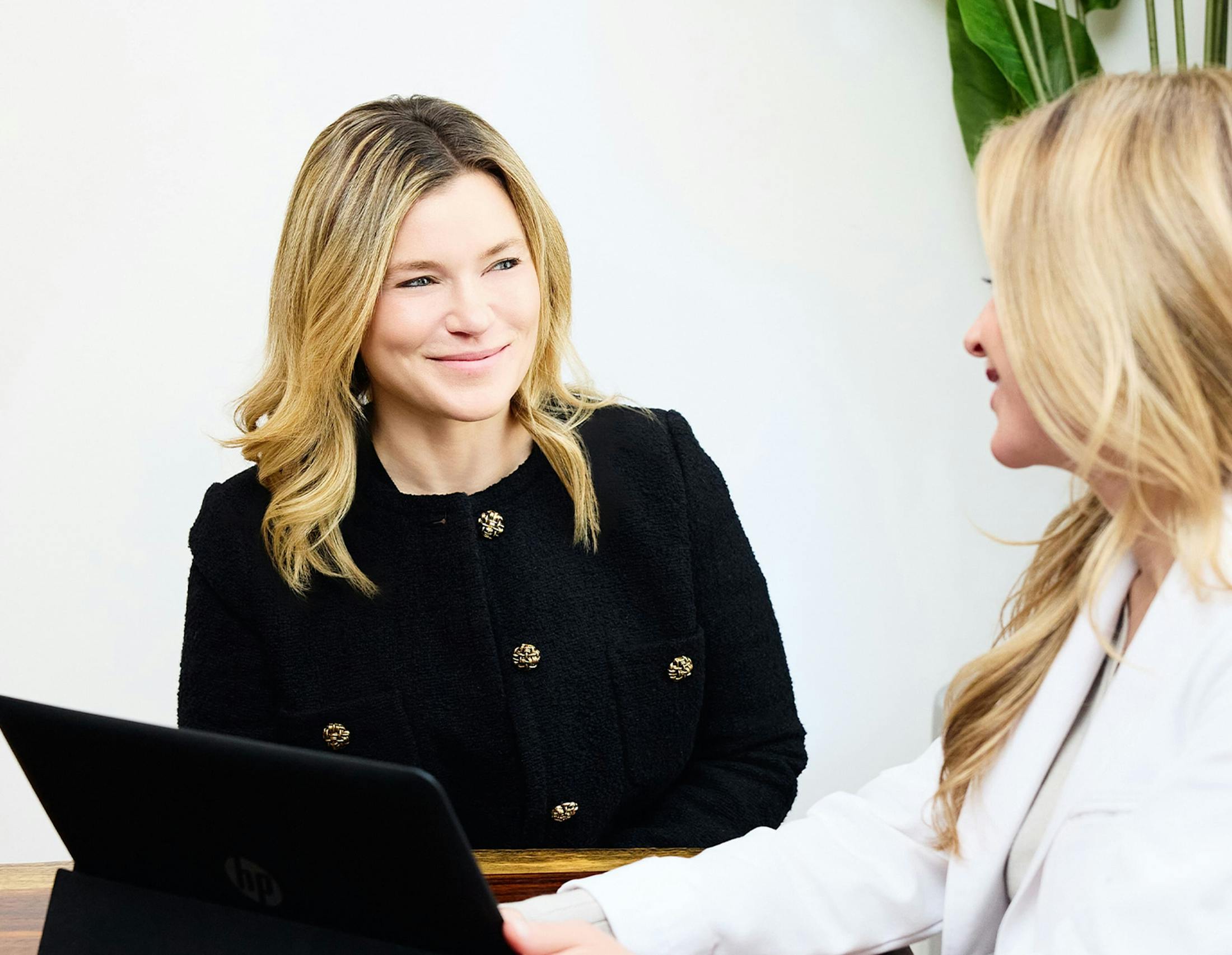patient talking with staff member
