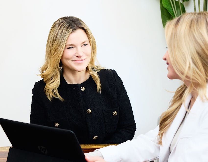 patient talking with staff member