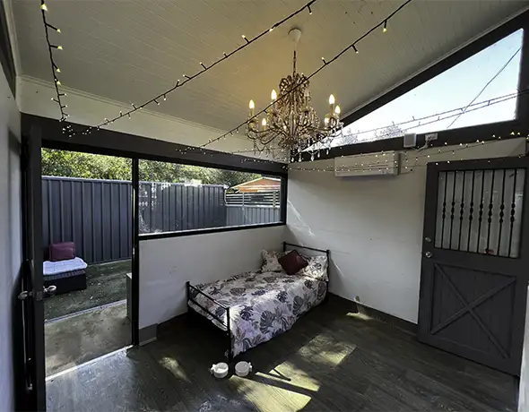 Deluxe Dog Suite with Elegant Chandelier and Bedding