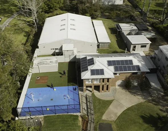 An aerial view of the Pet Resorts Australia Gumdale facility showing large dog splashpark, boutique suite and general dog boarding area
