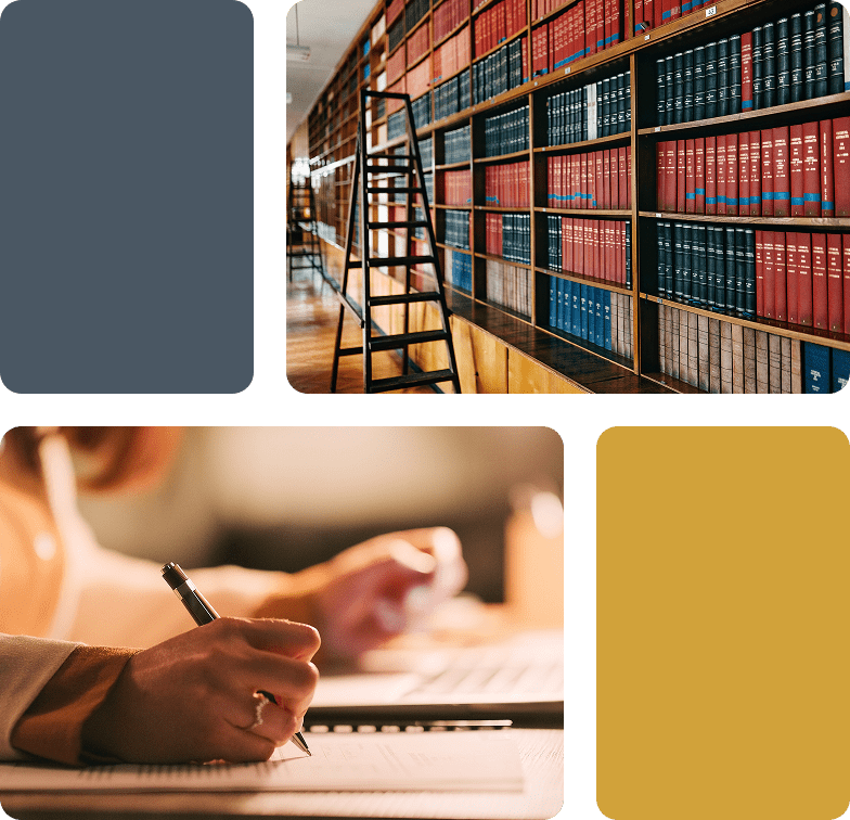 books on a bookshelf | person working on paperwork