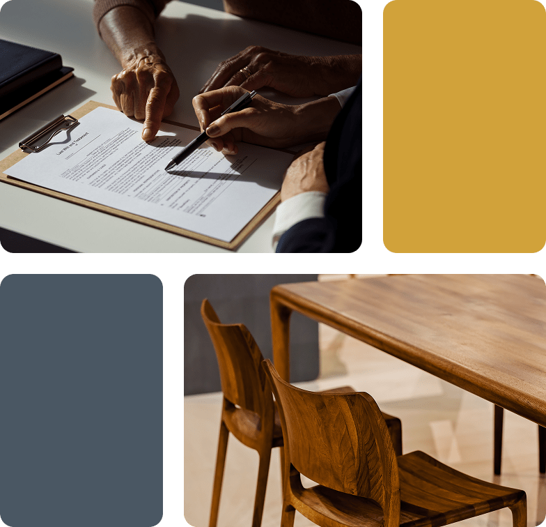 people signing a document | 2 wooden chairs at a table