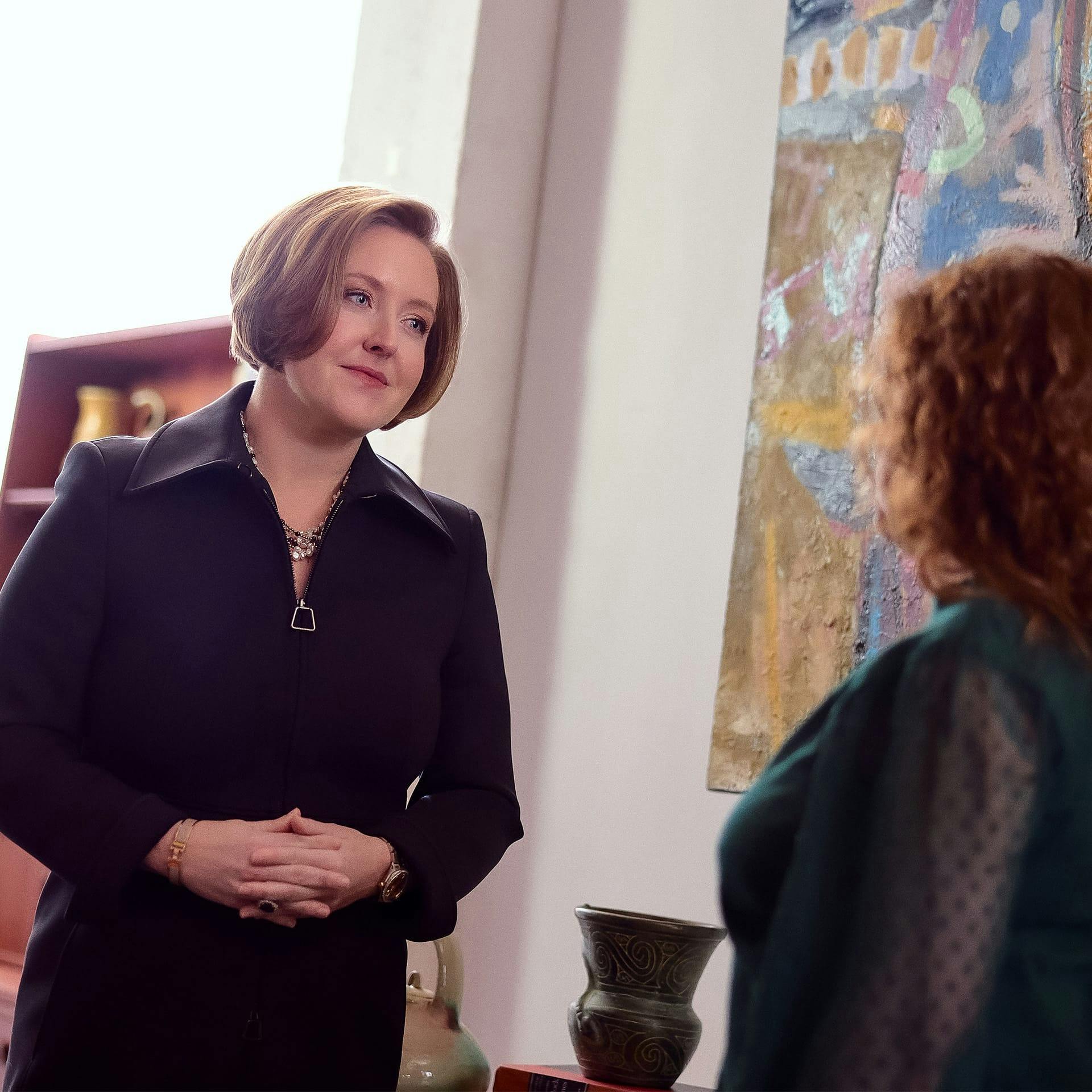 two women looking at each other