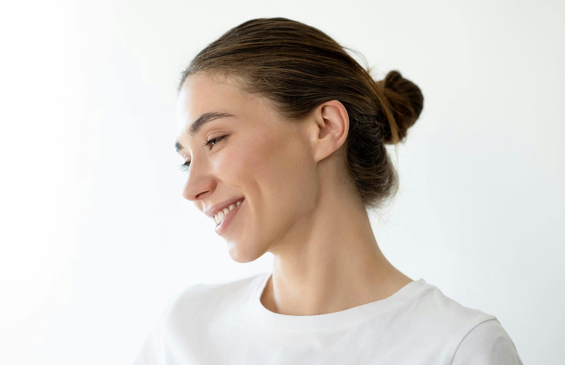 Woman smiling looking to the side