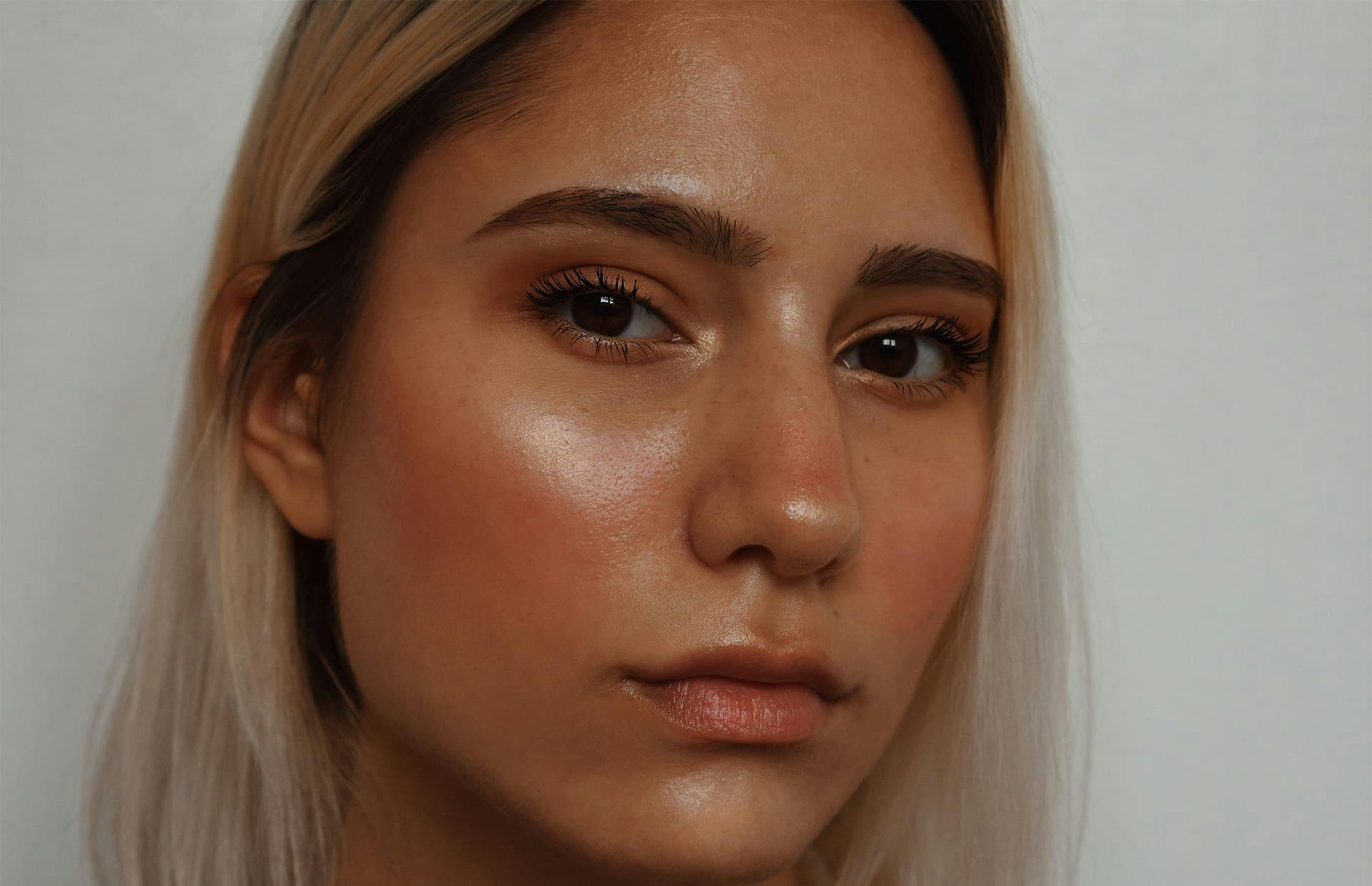 Woman with shiny skin close up