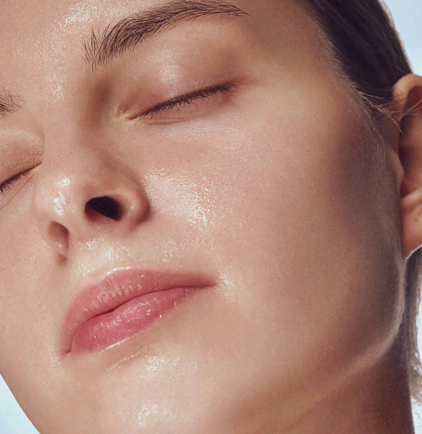 Close up of womans wet skin