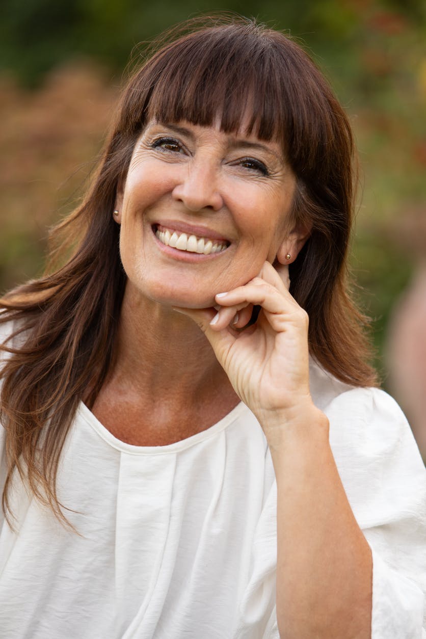 brown haired woman smiling
