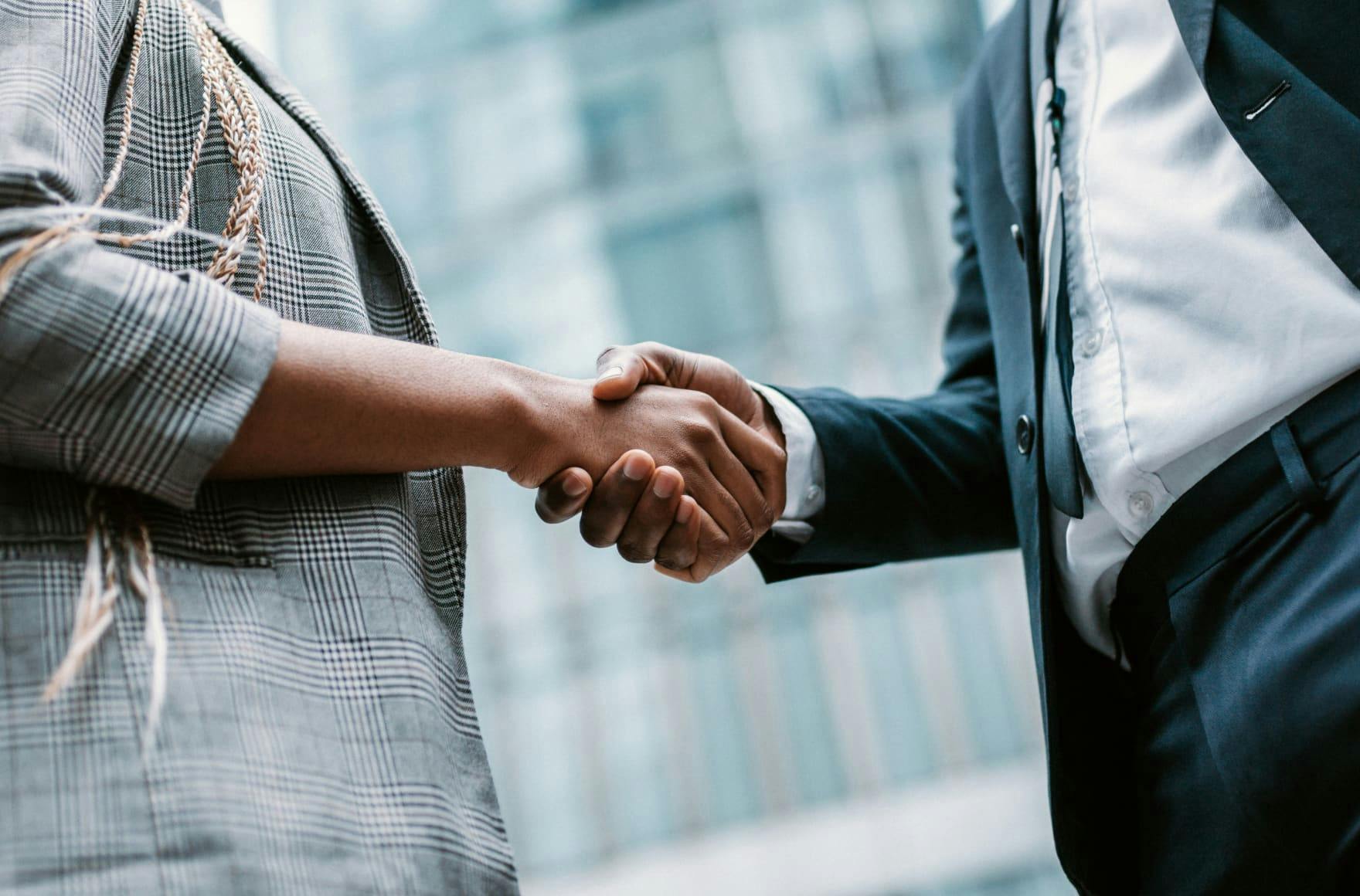 Two people shaking hands