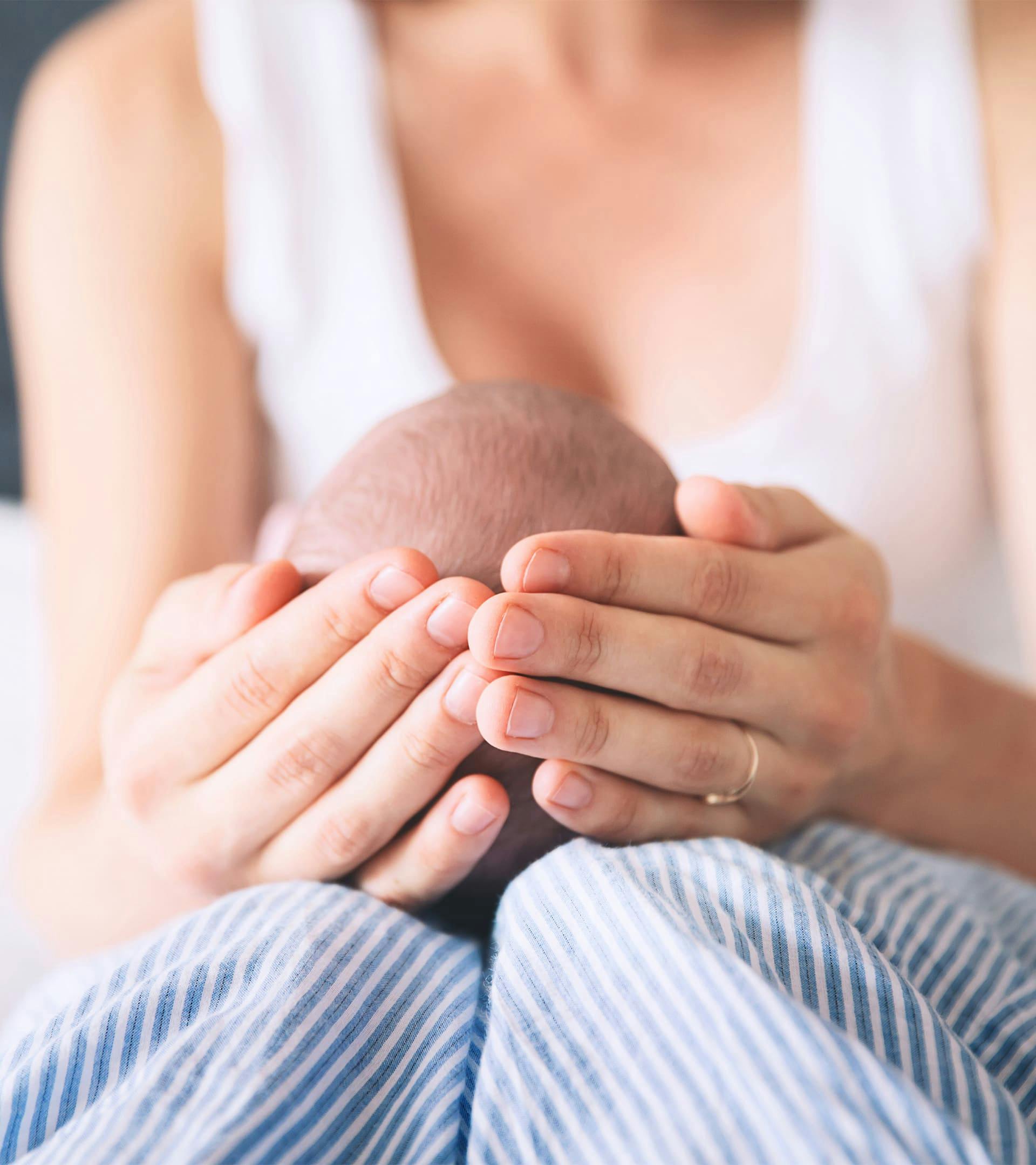 Woman holding her baby