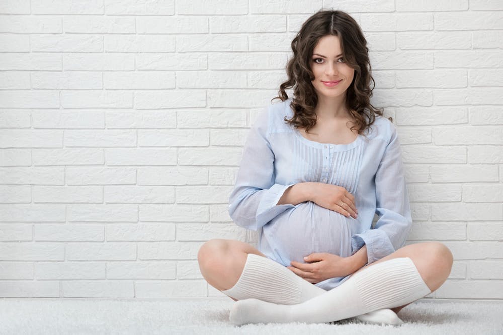portrait-of-the-young-pregnant-woman asking how does pregnancy affect women's hair loss