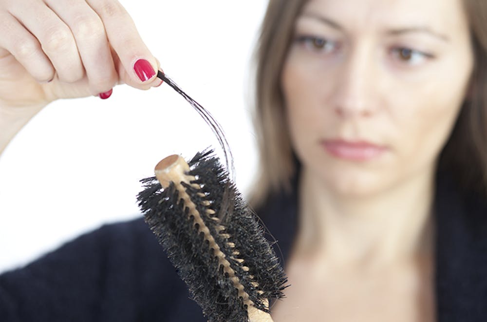 hair-loss-in-brush-700x463