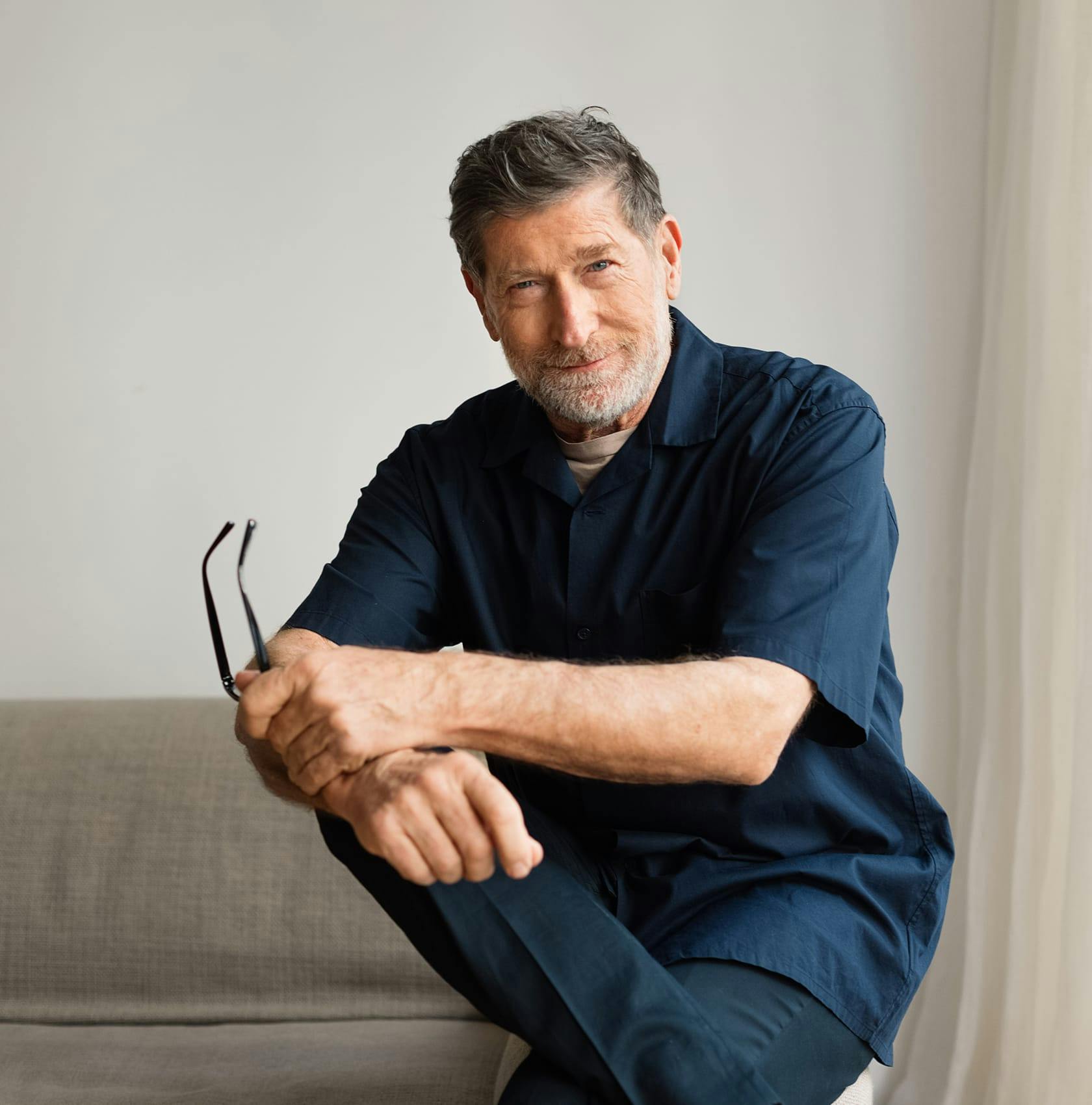 man in a blue shirt and pants