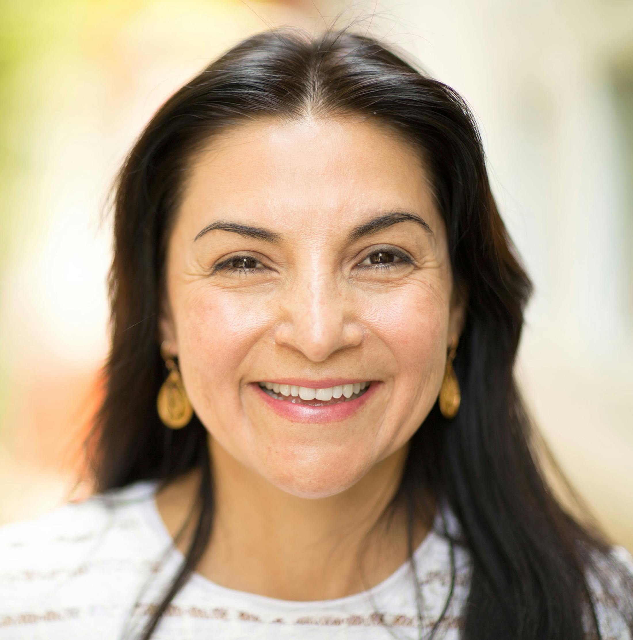 woman smiling forward