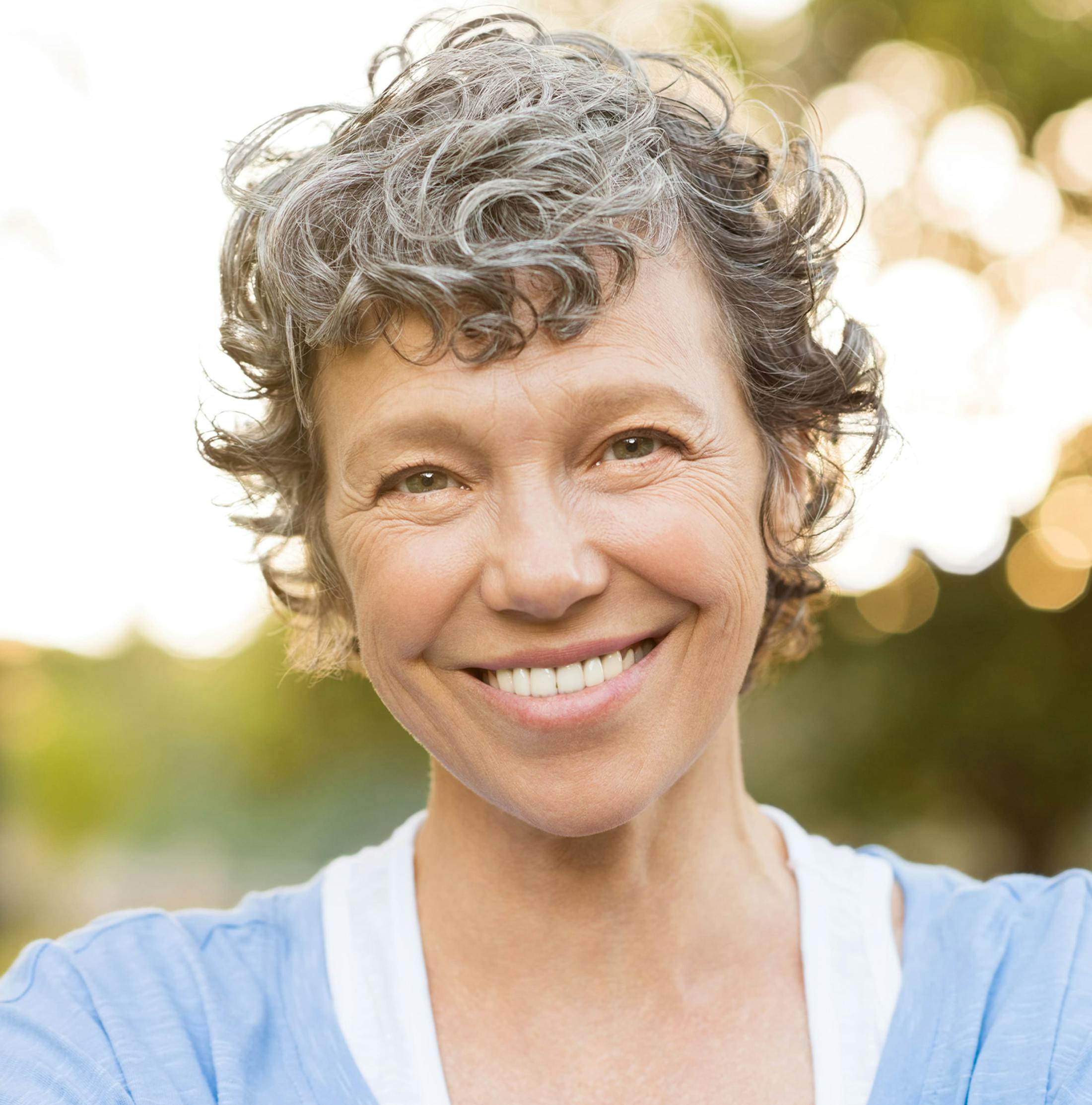 woman outside smiling