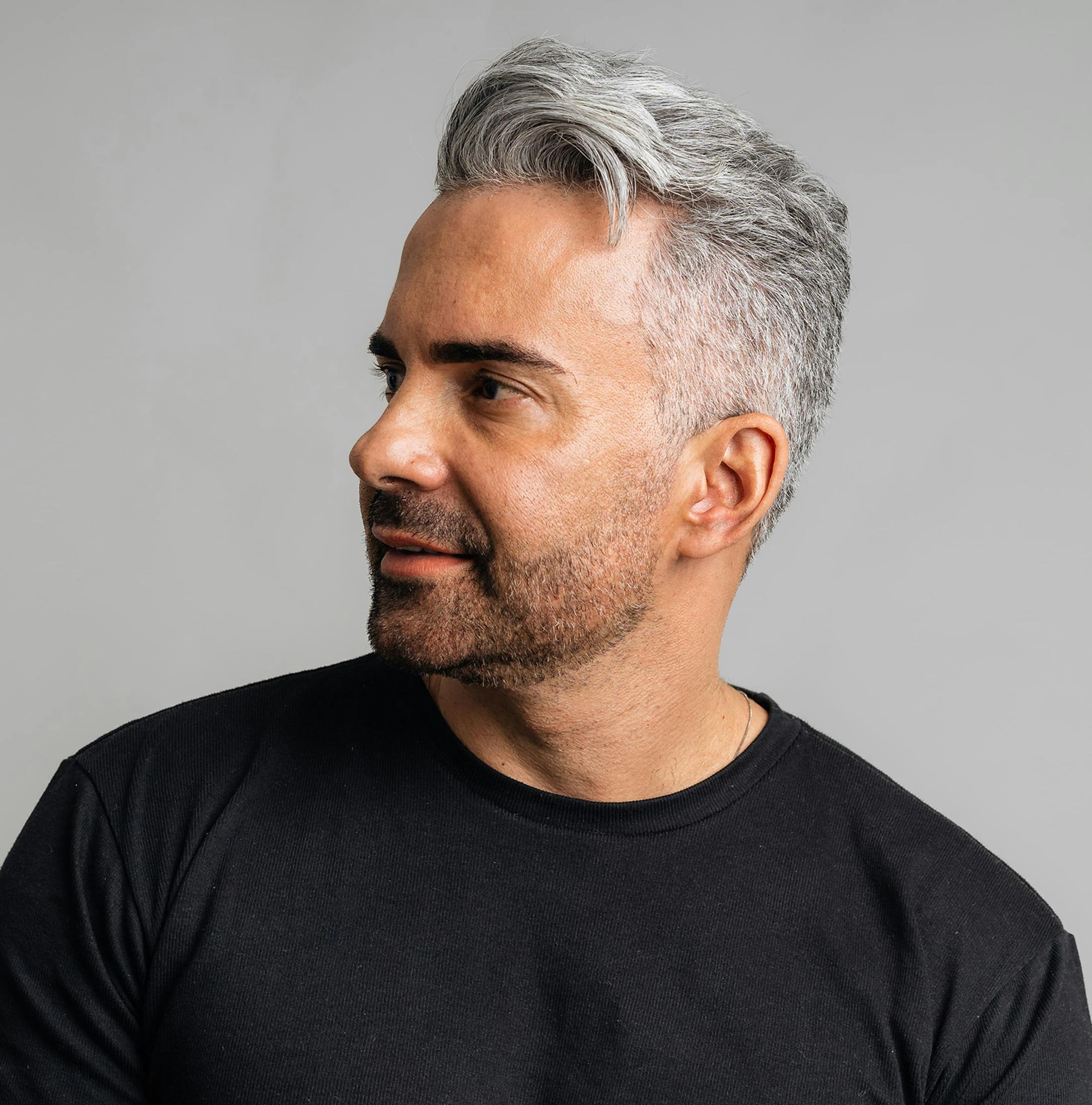 older man facing to the left