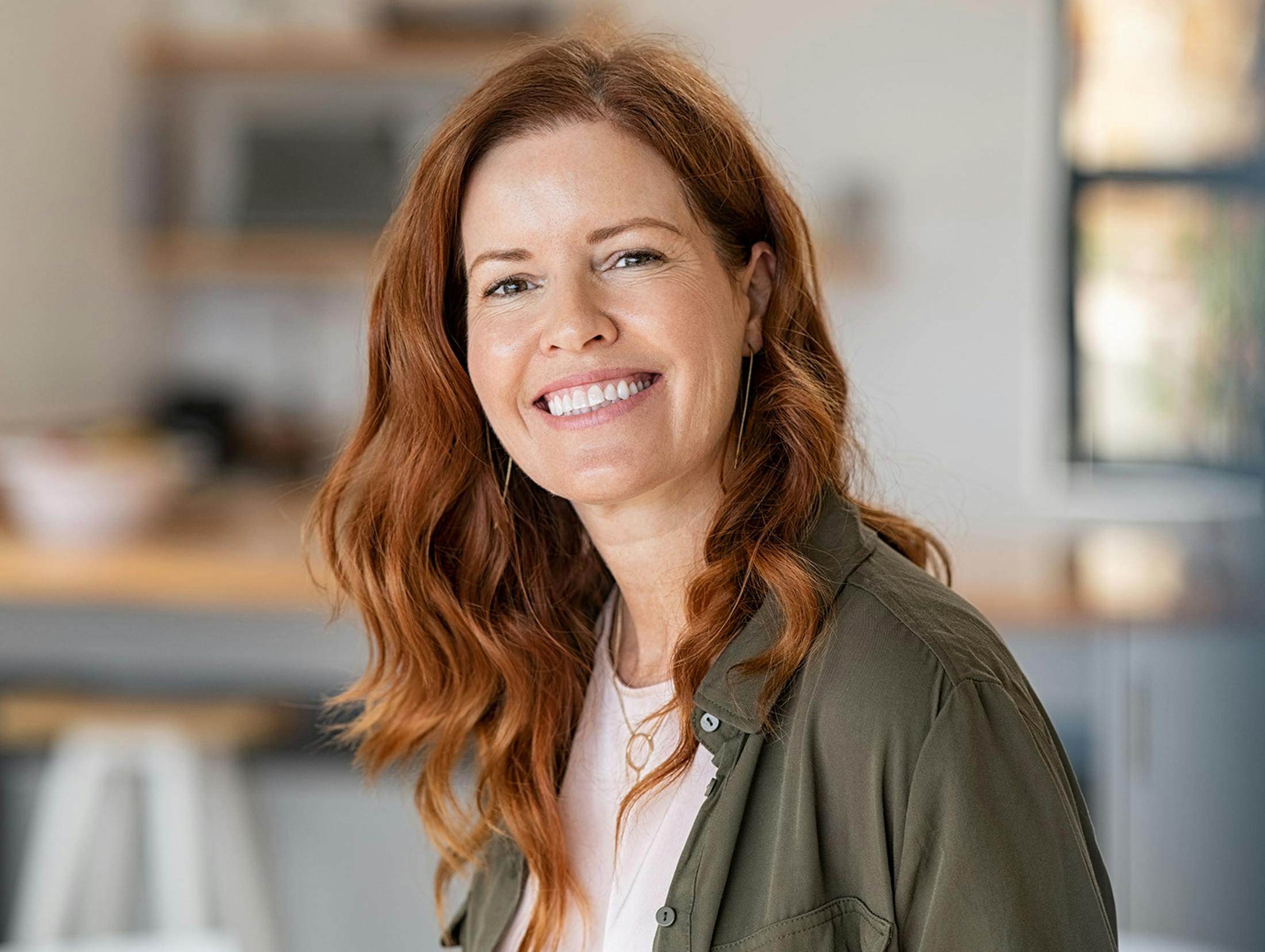 red head woman smiling