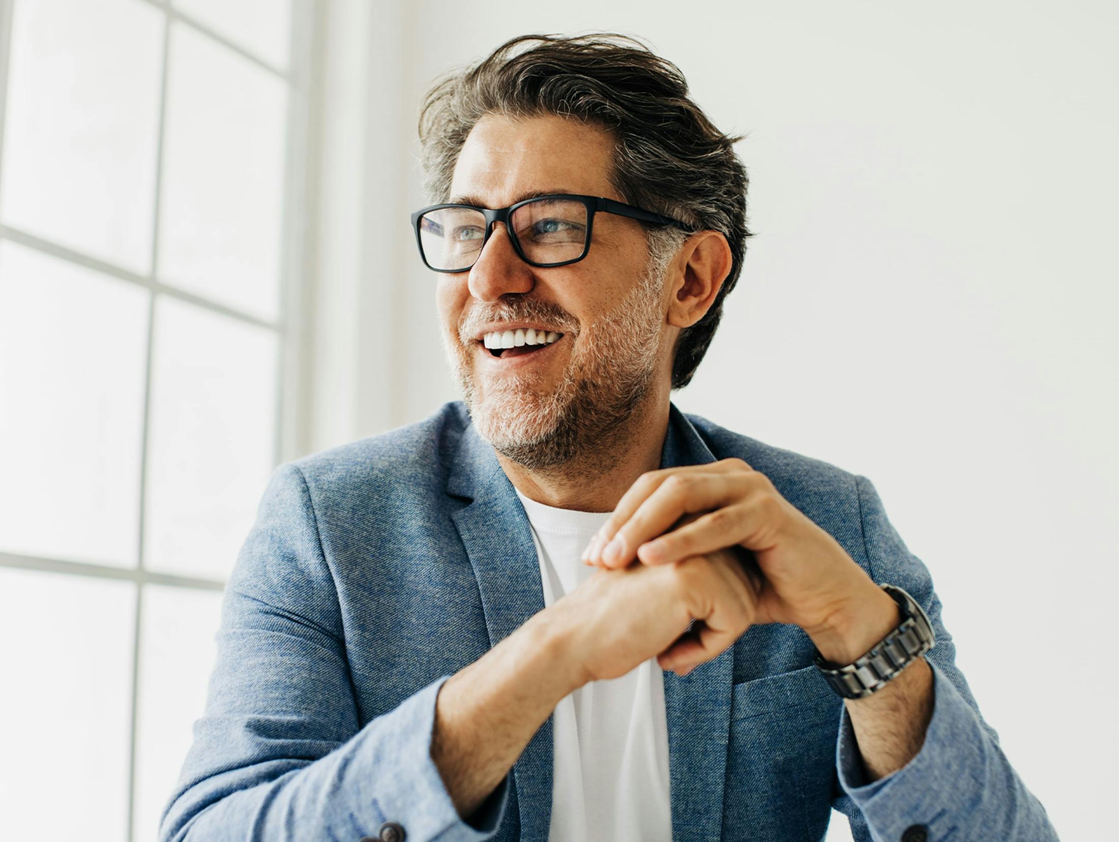 man smiling off camera
