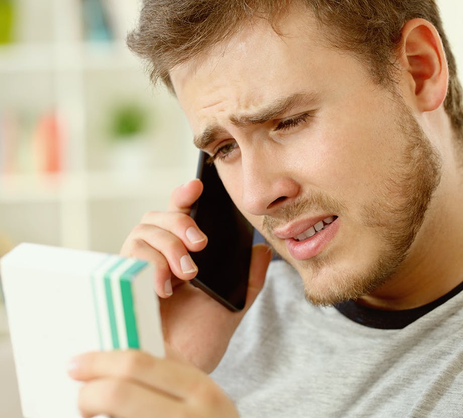 Distressed man on phone