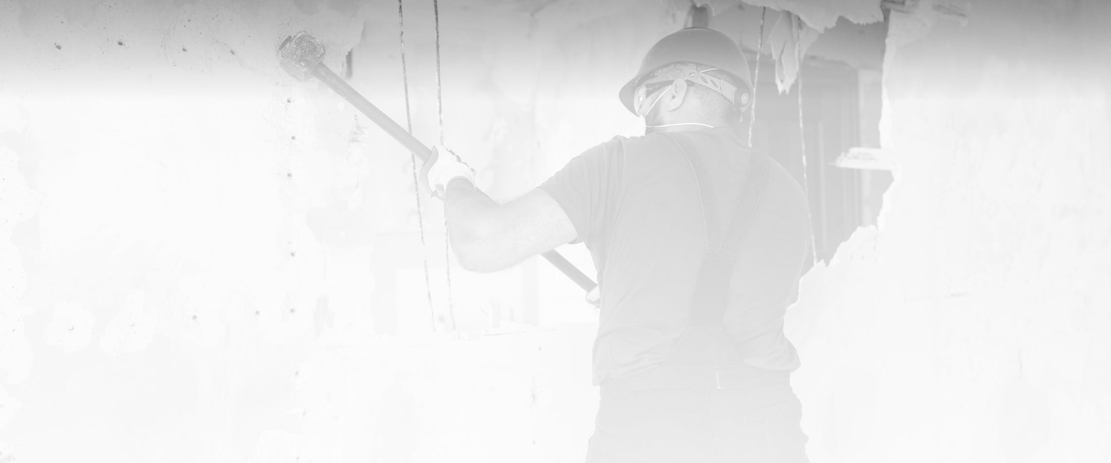 Worker doing demolition