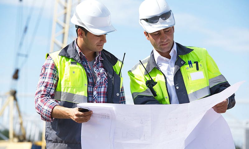 Two construction workers