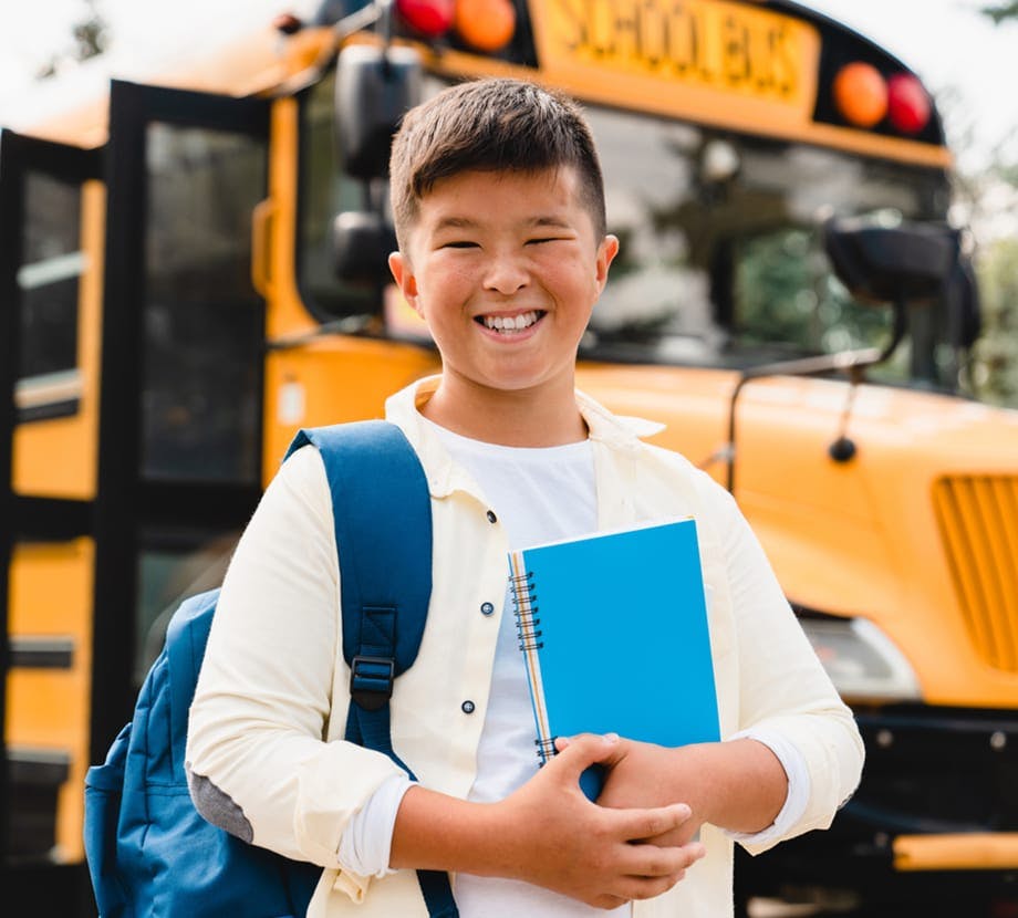 School bus and kid