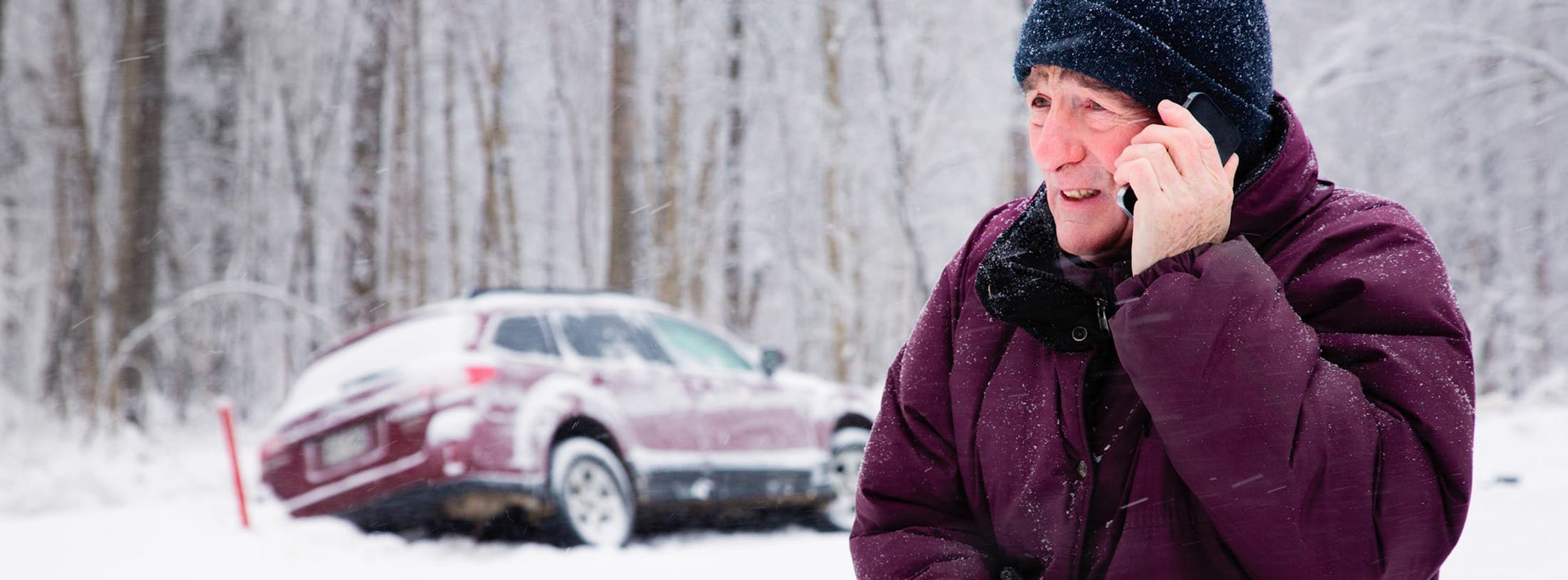 Winter car accident with distressed victim