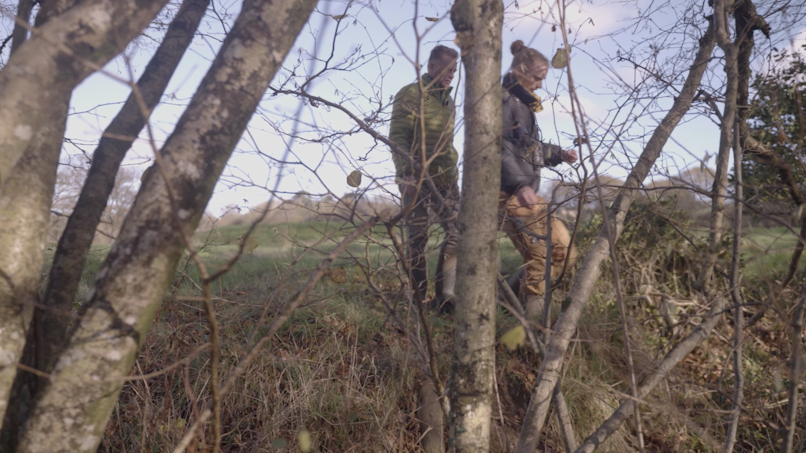 Chris Packham and Tay walking through Downicary