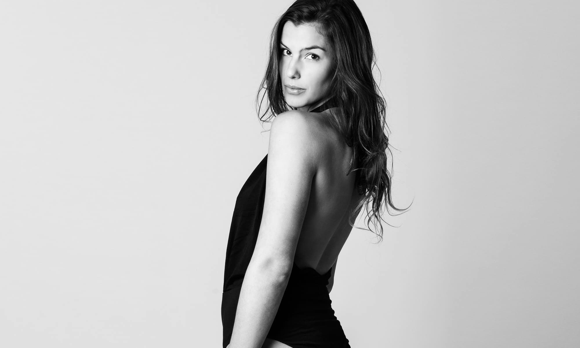 Woman looking over her shoulder
