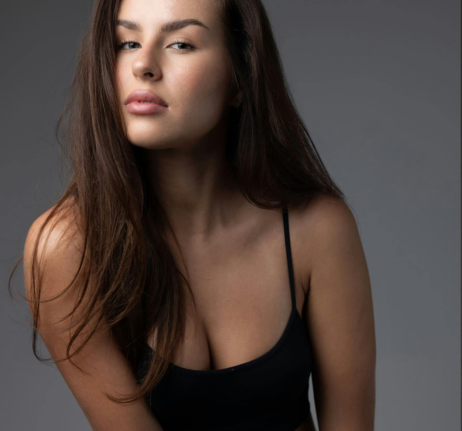 Woman leaning forward toward camera