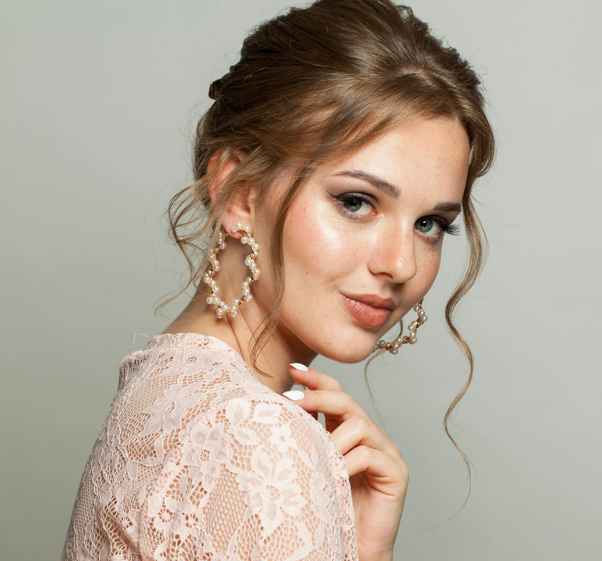 Woman smiling looking over shoulder