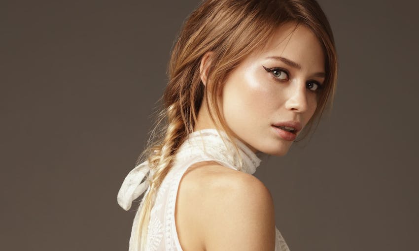 Woman looking over shoulder