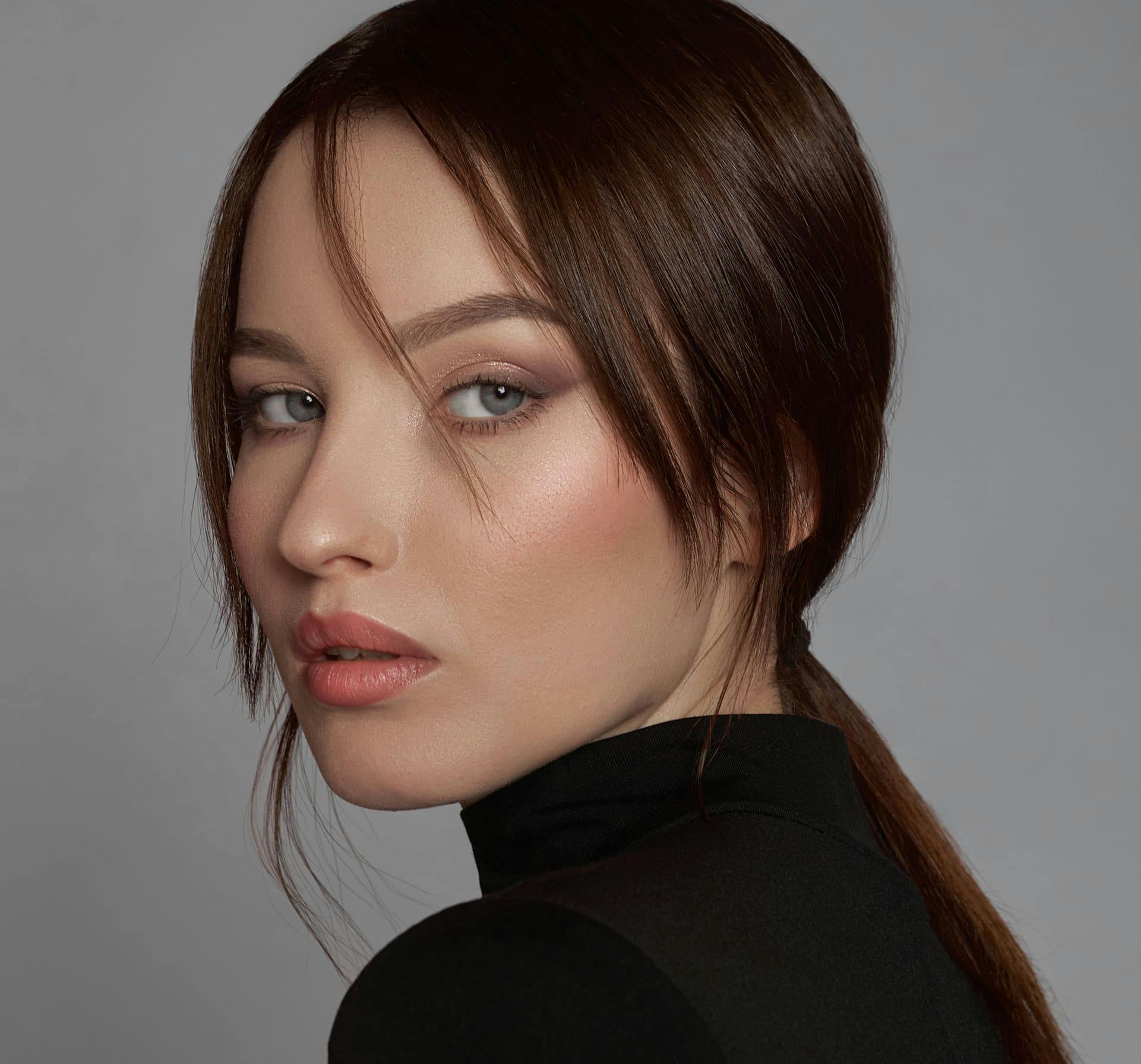 Woman looking over shoulder