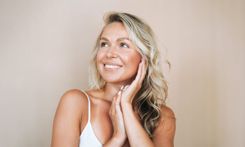 woman with blonde curly hair