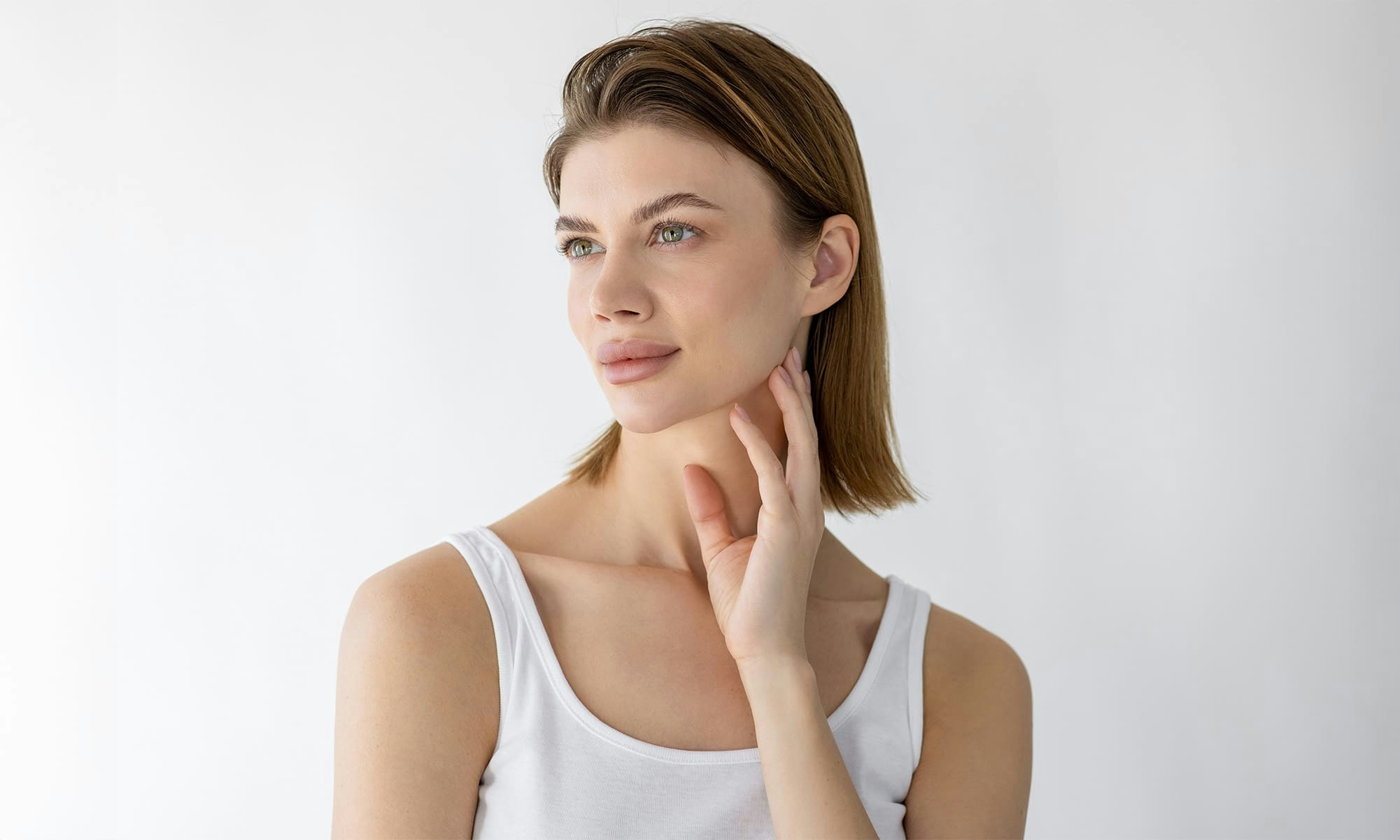 Woman touching chin