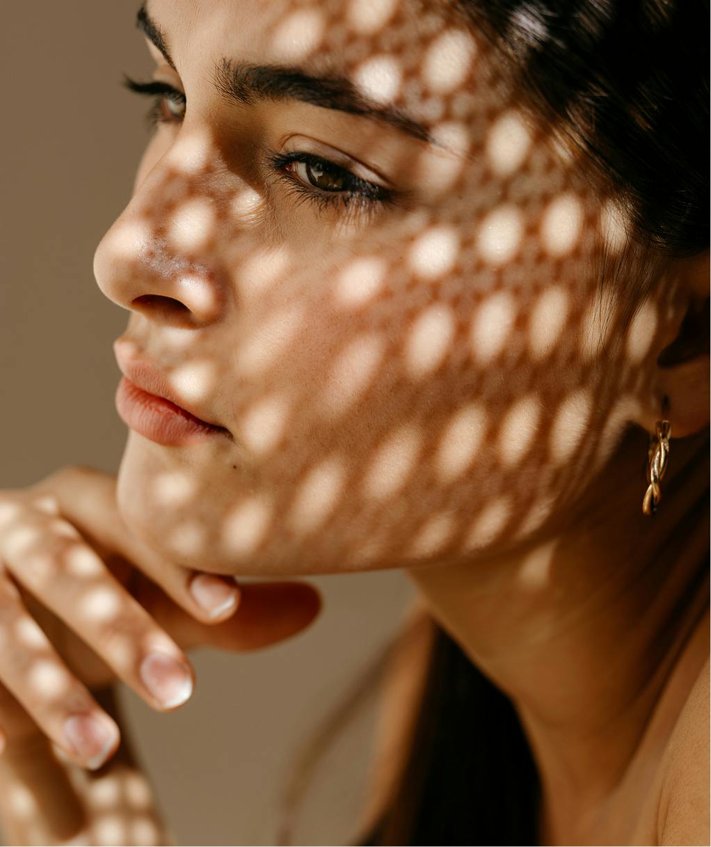 woman touching her chin