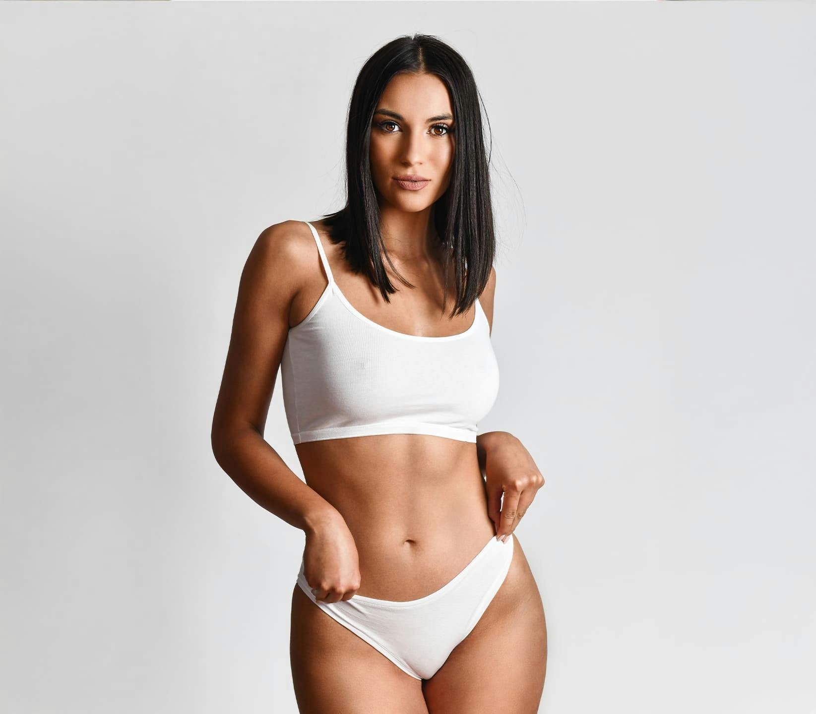 Woman in underwear smiling