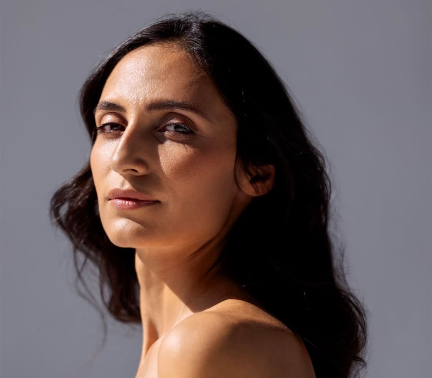 woman looking over her shoulder