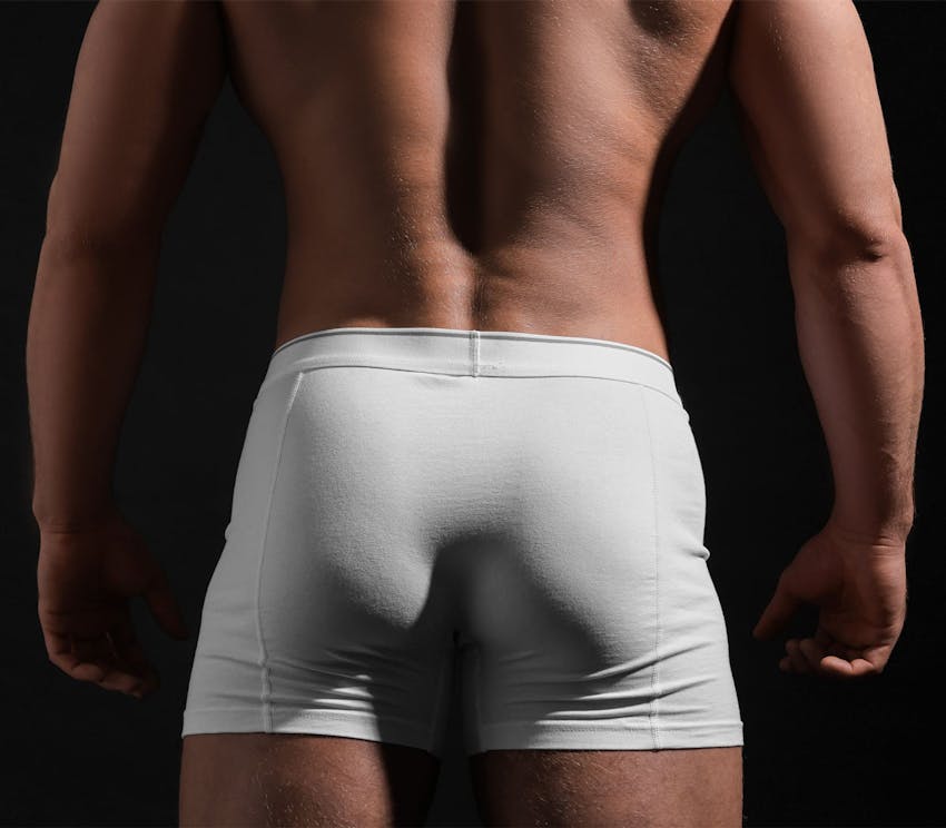 back side view of man's buttocks