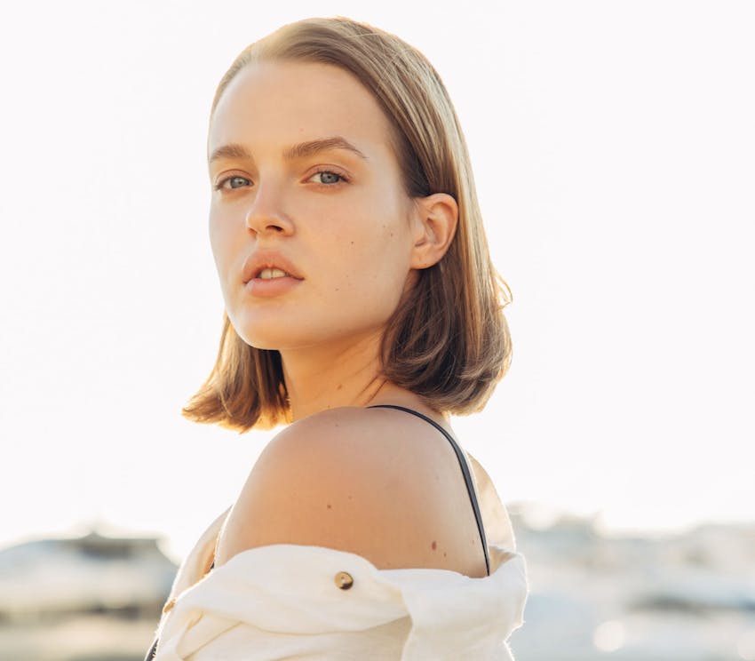 Woman looking over shoulder