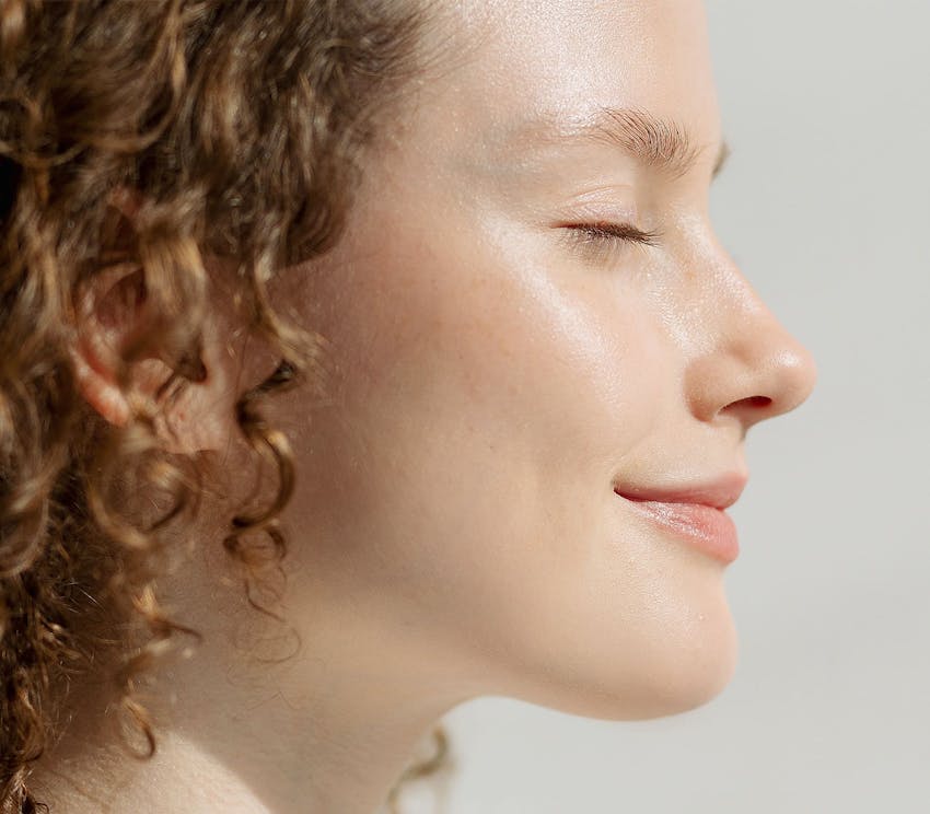 Close up side profile of a womans face