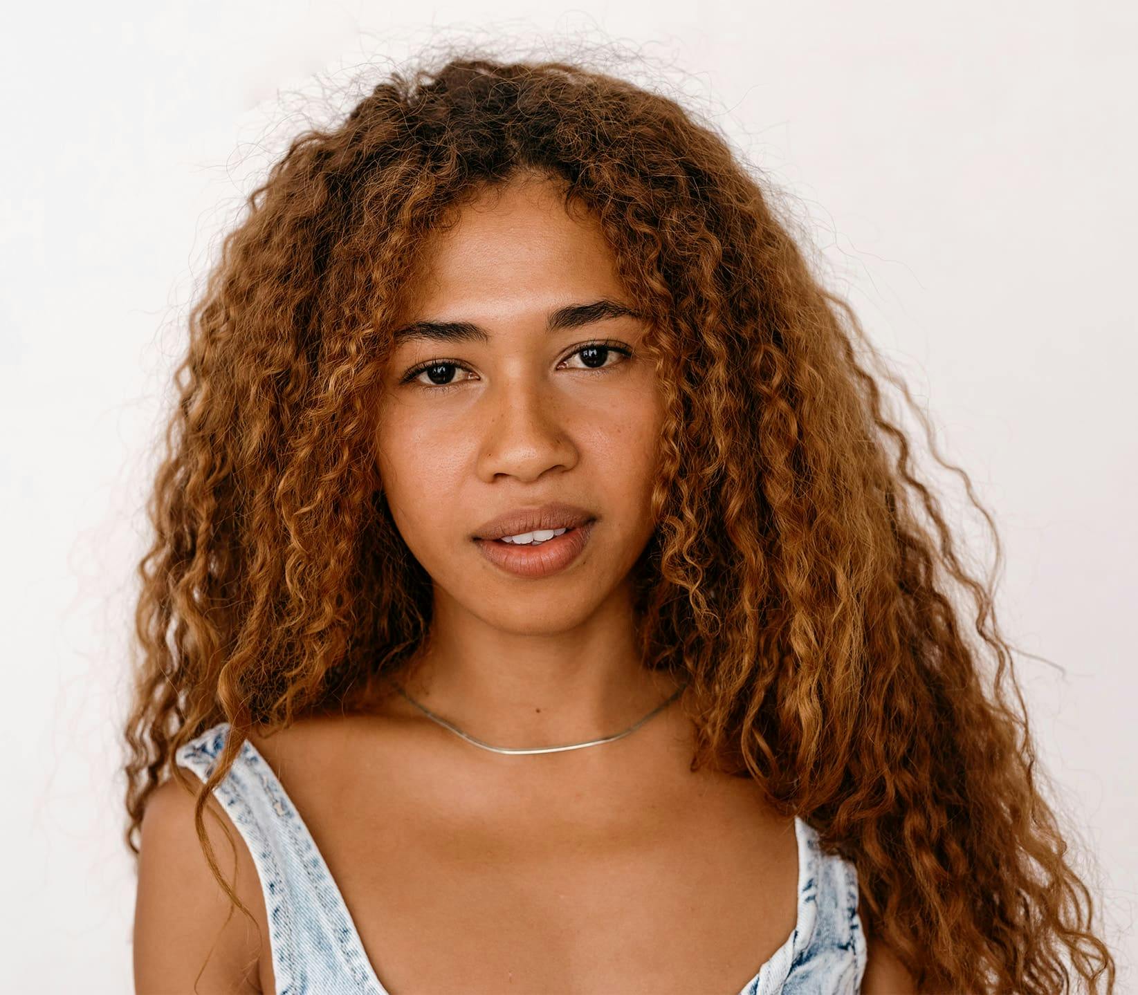 woman with long curly hair
