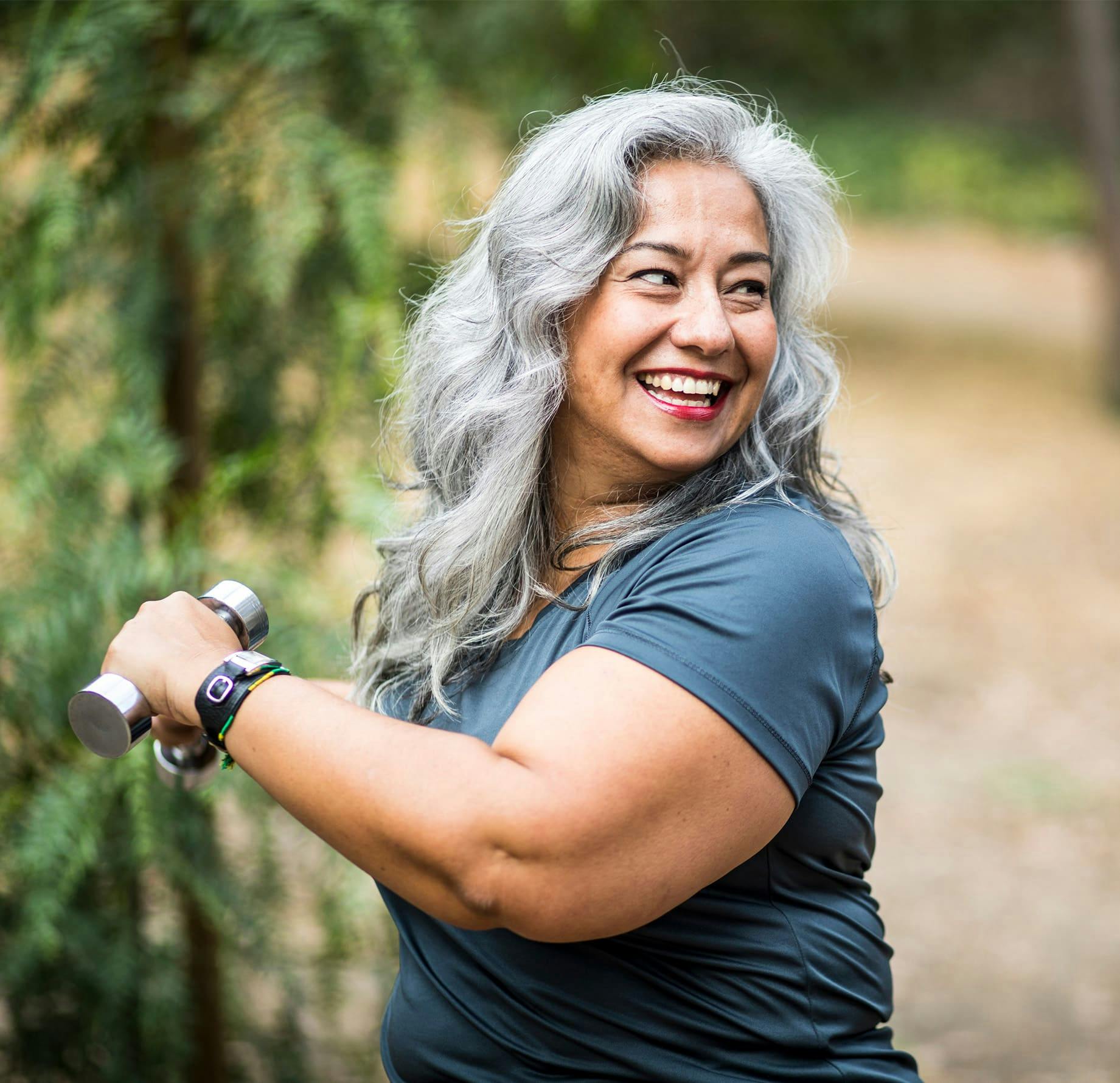 older woman working out outside