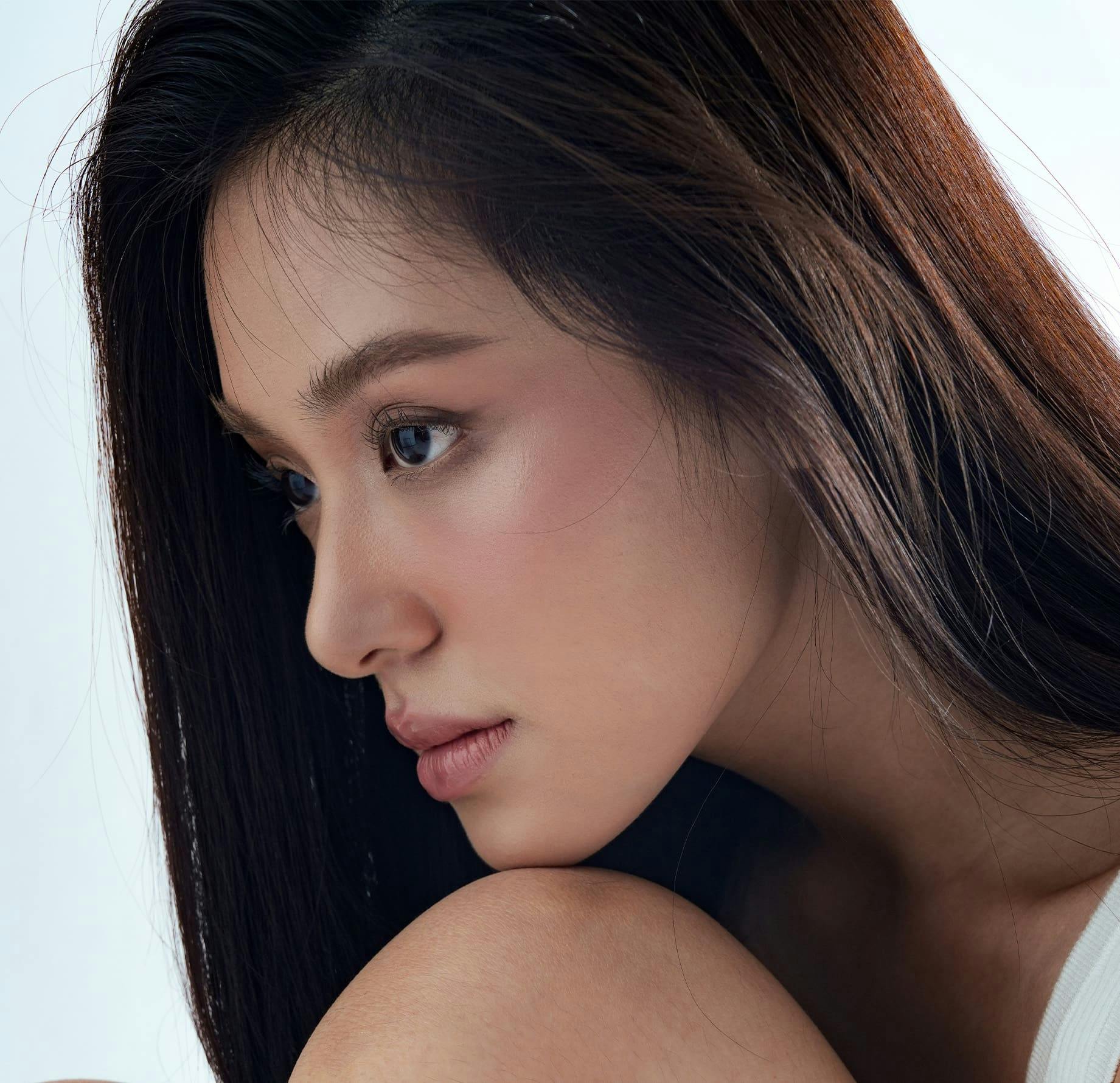 WOman resting chin on knee