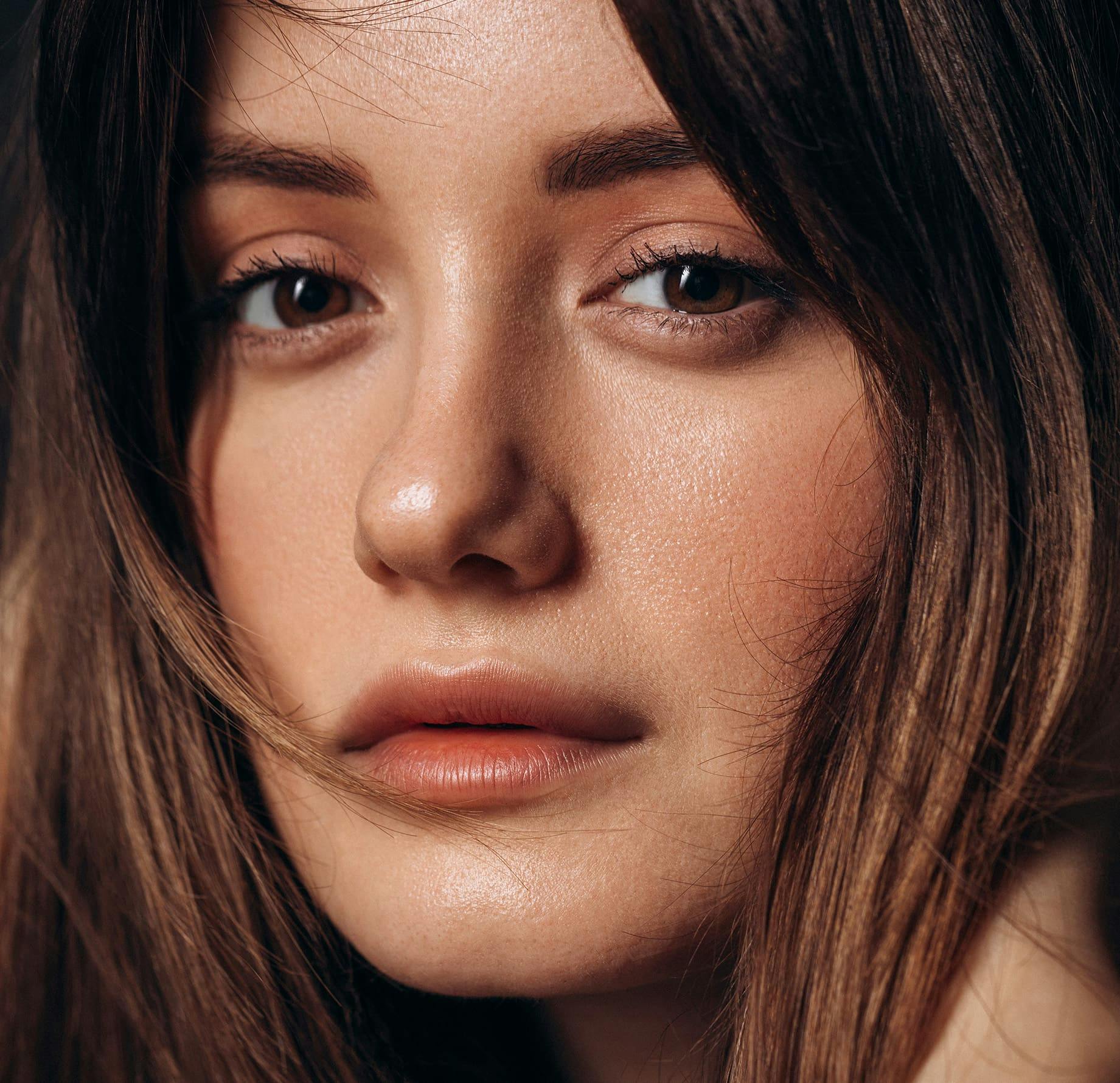 close up on woman with her hair around her face