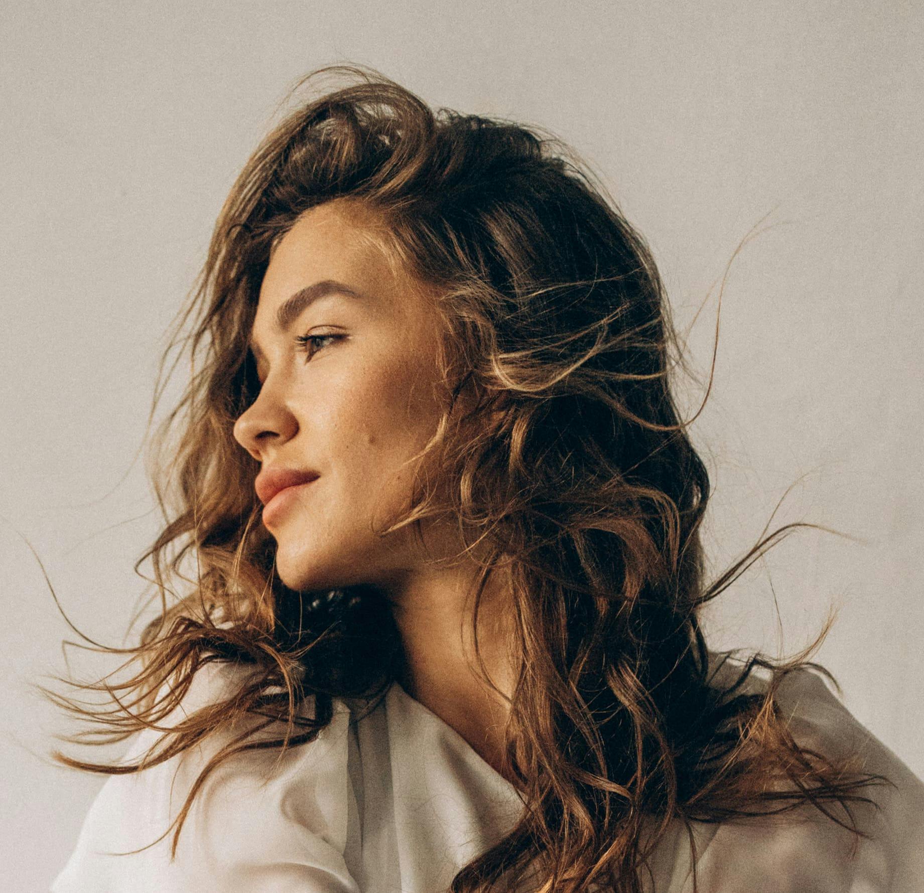 woman turning her head to the side