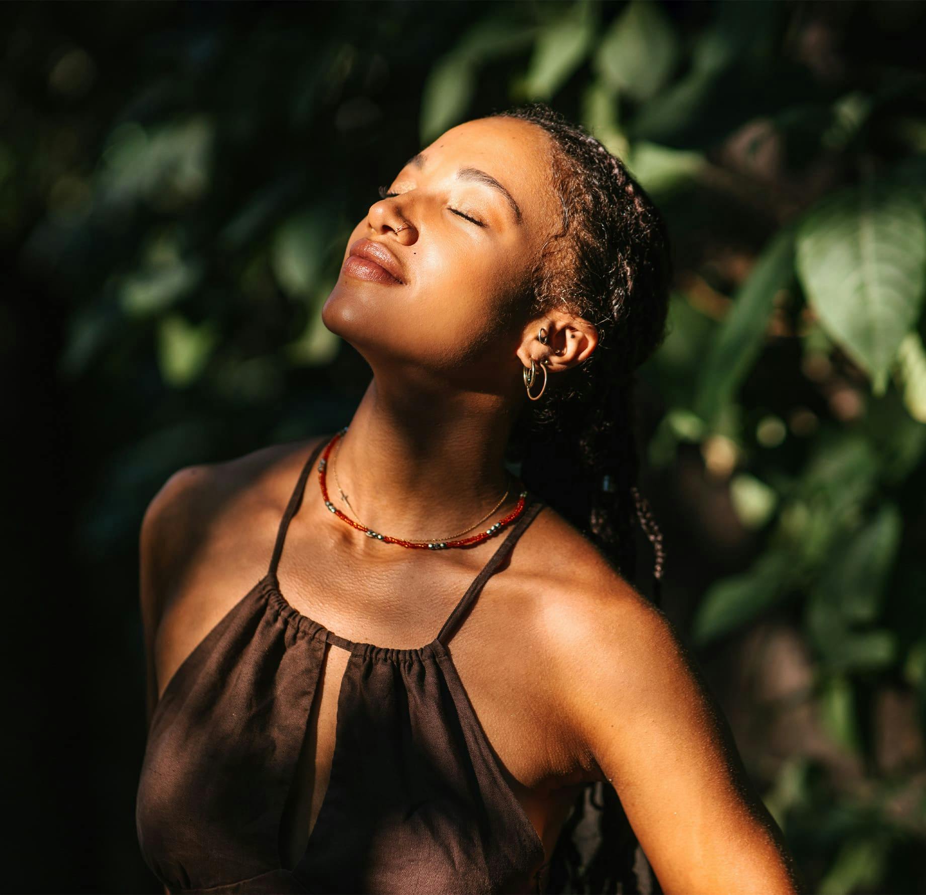 woman getting hit with sunlight