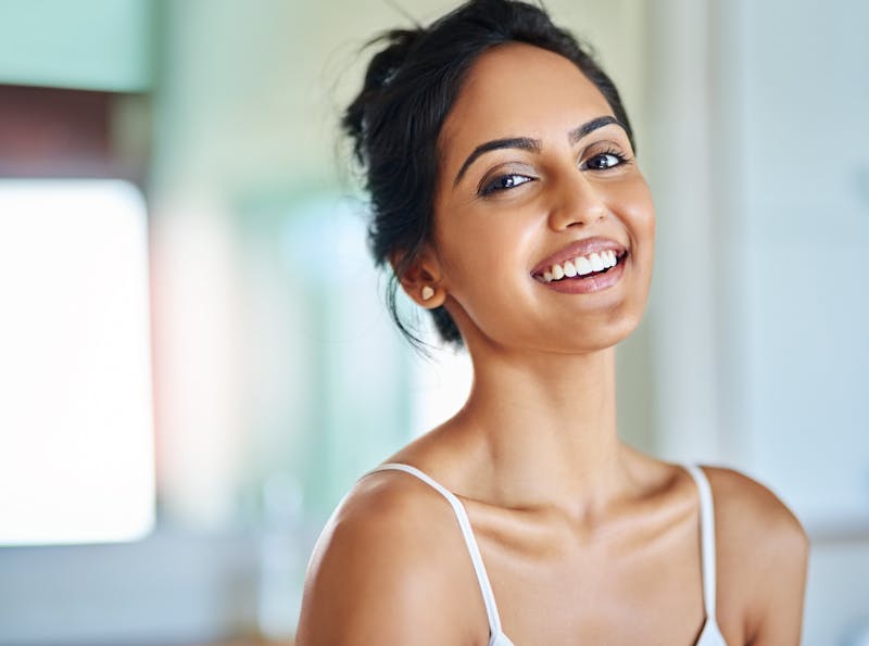 woman smiling with clear skin