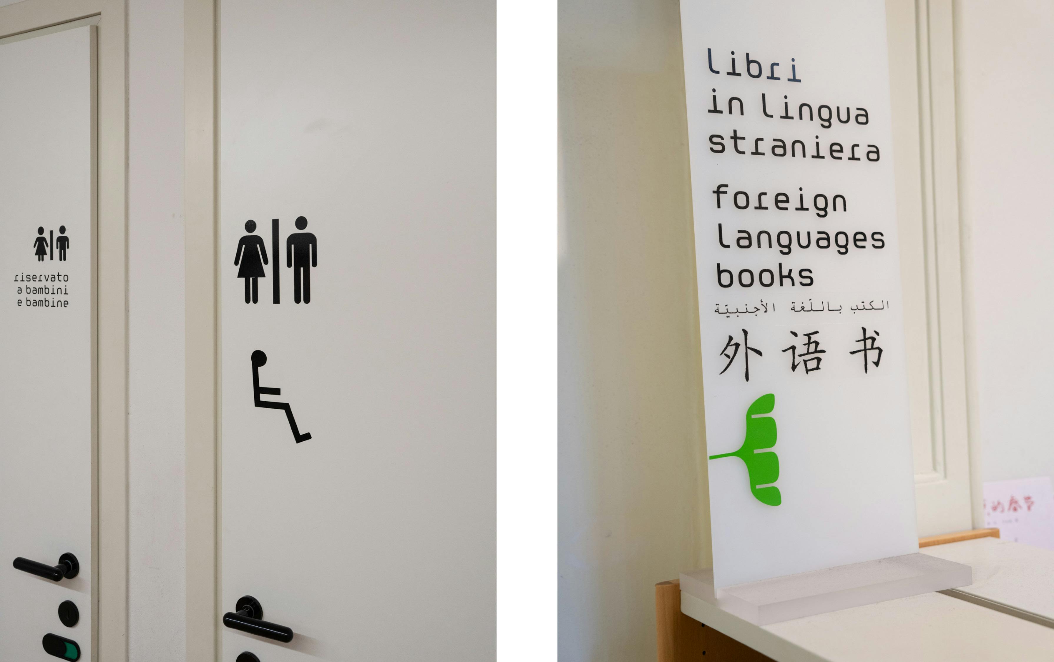 Bologna, Biblioteca Salaborsa.   Ingresso bagni, cartelli lingue stranieri